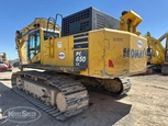 Back corner of used Excavator in yard